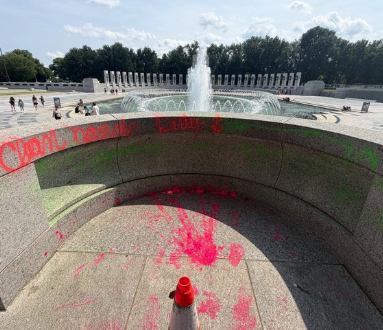 Disgraceful Anti-American Radical Democrat Defaces WW2 Monument in Washington DC